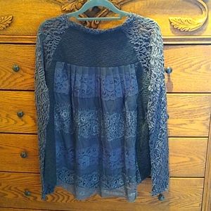 Beautiful long sleeve blouse in shades of grey and lace details.